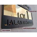 Laser-cut font, gold mirror inlay, matte black acrylic